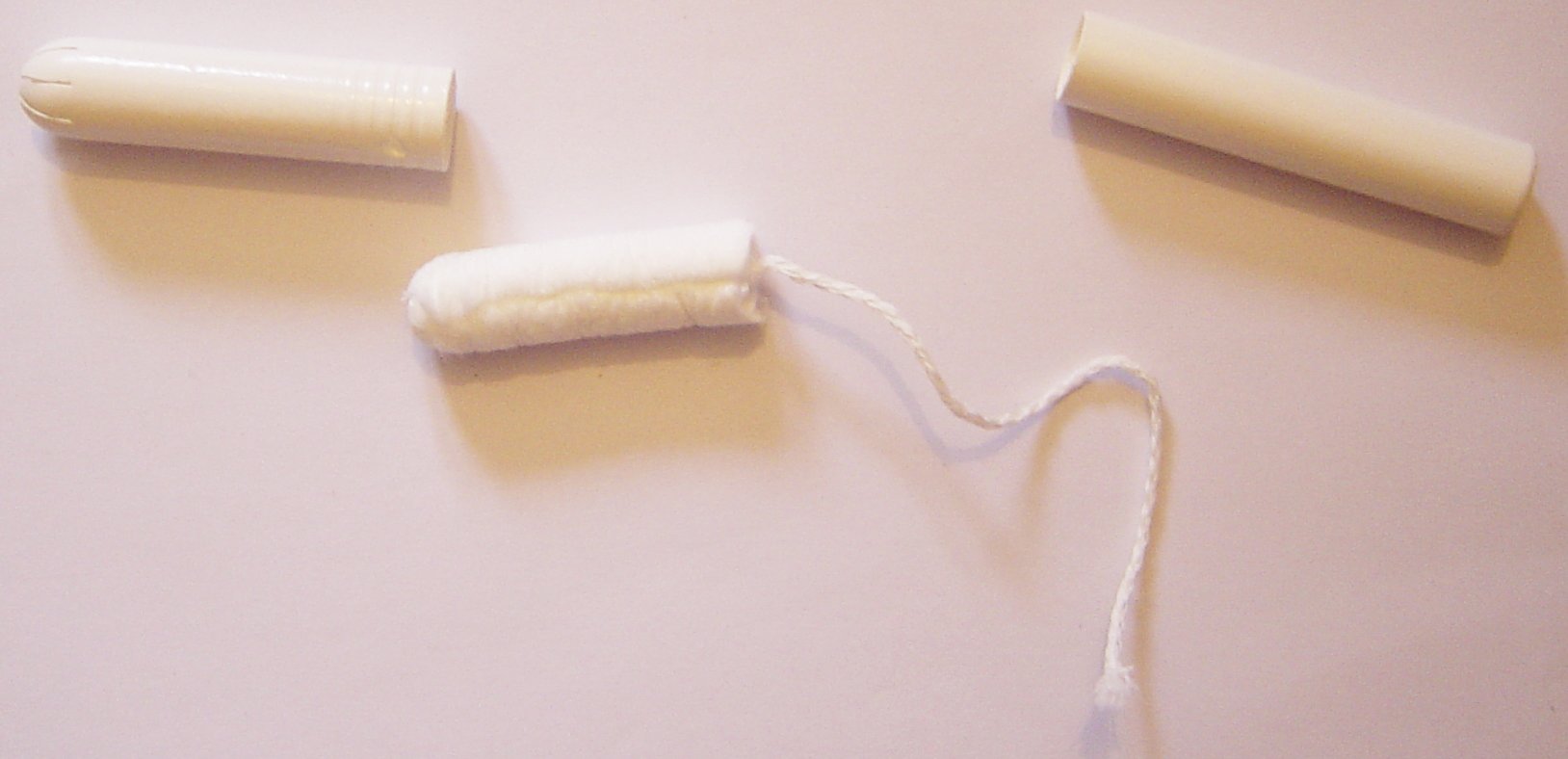 tampon on a light pink background